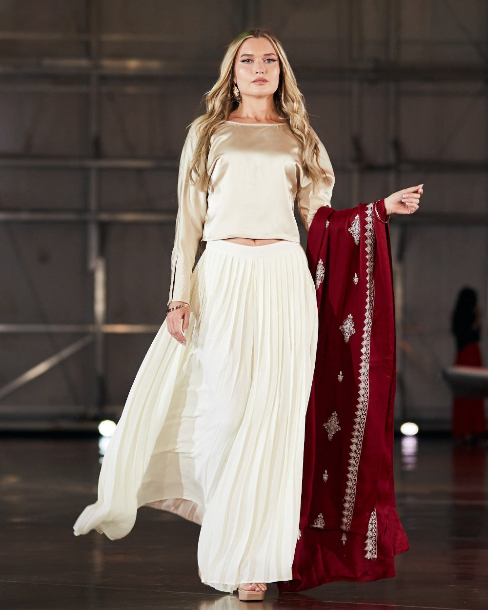 Model wearing Ayesha Ali Design top, skirt, and shawl